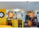 Kitchen features a breakfast bar and yellow walls at 3756 Harvest Dr, Atlanta, GA 30034