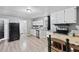 Bright kitchen featuring stainless steel appliances and plenty of cabinet space at 204 Morris St, Palmetto, GA 30268