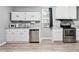 Bright kitchen featuring stainless steel appliances and plenty of cabinet space at 204 Morris St, Palmetto, GA 30268