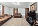 Comfortable living room featuring carpet floors and two sofas at 204 Morris St, Palmetto, GA 30268