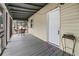 Inviting porch with cozy seating area, perfect for relaxing outdoors at 204 Morris St, Palmetto, GA 30268