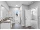Bright bathroom with double granite vanity, and access to the closet and bedroom at 4139 Torver Ln, Atlanta, GA 30341