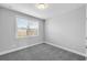 Bedroom with a large window allowing natural light at 4139 Torver Ln, Atlanta, GA 30341