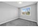 Bedroom with a large window allowing natural light at 4139 Torver Ln, Atlanta, GA 30341