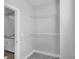 Spacious closet with two rods for hanging clothes at 4139 Torver Ln, Atlanta, GA 30341