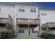 View of the back exterior of the building with multiple decks at 4139 Torver Ln, Atlanta, GA 30341