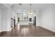 Bright open kitchen with an island, stainless steel appliances, and an eat-in breakfast area at 4139 Torver Ln, Atlanta, GA 30341