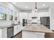 Bright open kitchen featuring granite countertops, stainless steel appliances, and island at 4139 Torver Ln, Atlanta, GA 30341