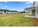 Large, green backyard with view of other homes in the community at 722 Crossroad Ct, Powder Springs, GA 30127