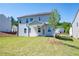 Covered patio overlooking a large backyard at 722 Crossroad Ct, Powder Springs, GA 30127