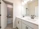 Bathroom with double vanity and a tub shower combo at 722 Crossroad Ct, Powder Springs, GA 30127