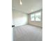 Comfortable bedroom with neutral carpet and natural light at 722 Crossroad Ct, Powder Springs, GA 30127