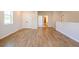 Bonus room featuring hardwood floors and access to other rooms at 722 Crossroad Ct, Powder Springs, GA 30127