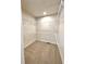 Walk-in closet with installed shelving, allowing for optimal organization and storage at 722 Crossroad Ct, Powder Springs, GA 30127