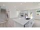 Contemporary kitchen with a central island, and views of the living space at 722 Crossroad Ct, Powder Springs, GA 30127