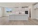 Gourmet kitchen with a spacious island, modern appliances, and ample cabinet space at 722 Crossroad Ct, Powder Springs, GA 30127