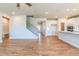 Open living space with hardwood floors and a staircase at 722 Crossroad Ct, Powder Springs, GA 30127