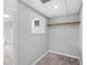 Basement closet with shelving and window at 4006 Maxanne Nw Dr, Kennesaw, GA 30144