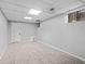 Large finished basement area with neutral carpeting at 4006 Maxanne Nw Dr, Kennesaw, GA 30144