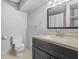 Basement bathroom with dark vanity and shower at 4006 Maxanne Nw Dr, Kennesaw, GA 30144
