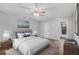 Spacious bedroom with wood-look flooring and ceiling fan at 4006 Maxanne Nw Dr, Kennesaw, GA 30144