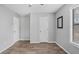 Simple bedroom with wood-look flooring and neutral walls at 4006 Maxanne Nw Dr, Kennesaw, GA 30144