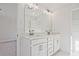 Double vanity bathroom with modern white cabinets at 1608 Ruskin Way, Marietta, GA 30062