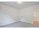 Bright bedroom with double doors and grey carpet at 1608 Ruskin Way, Marietta, GA 30062