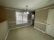 Bright dining area with tile floors and neutral walls at 3116 Leyland Ct, Decatur, GA 30034