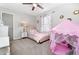 Cozy bedroom with a playful pink play tent and plenty of storage at 326 Scarlett Ln, Woodstock, GA 30188