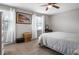 Charming bedroom with neutral walls, carpet flooring, and plenty of natural light at 326 Scarlett Ln, Woodstock, GA 30188