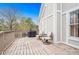 Deck with built-in seating and grill overlooking wooded area at 326 Scarlett Ln, Woodstock, GA 30188