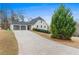 Long driveway leading to a two-car garage at 326 Scarlett Ln, Woodstock, GA 30188