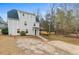 Two-story house with front yard and landscaping at 326 Scarlett Ln, Woodstock, GA 30188