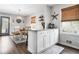 Modern kitchen with white cabinets and granite countertops at 326 Scarlett Ln, Woodstock, GA 30188