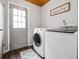 Convenient laundry room with washer, dryer, and exterior access at 326 Scarlett Ln, Woodstock, GA 30188