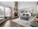 Spacious living room with stone fireplace and high ceilings at 326 Scarlett Ln, Woodstock, GA 30188