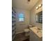 Clean bathroom with a shower/tub combo and vanity at 5250 Mountain Village Ct, Stone Mountain, GA 30083