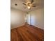 Large bedroom with wood-look floors and double closets at 5250 Mountain Village Ct, Stone Mountain, GA 30083