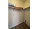 Small closet with shelving, ideal for storage at 5250 Mountain Village Ct, Stone Mountain, GA 30083