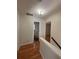 Upper level hallway with bathroom access and bedrooms at 5250 Mountain Village Ct, Stone Mountain, GA 30083