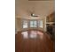 Living room with hardwood floors, fireplace and bay window at 5250 Mountain Village Ct, Stone Mountain, GA 30083