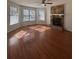 Spacious living room with hardwood floors and fireplace at 5250 Mountain Village Ct, Stone Mountain, GA 30083