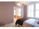 Bright bedroom with hardwood floors and large windows at 32 Peachtree Nw St # 1601, Atlanta, GA 30303