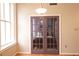 Bedroom entry with purple doors and hardwood floors at 32 Peachtree Nw St # 1601, Atlanta, GA 30303