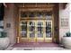 Grand building entrance with ornate bronze doors and details at 32 Peachtree Nw St # 1601, Atlanta, GA 30303