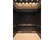 Dark wood elevator interior with detailed paneling at 32 Peachtree Nw St # 1601, Atlanta, GA 30303