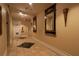 Elegant hallway with mirrors and decorative sconces at 32 Peachtree Nw St # 1601, Atlanta, GA 30303