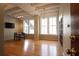 Open living area with hardwood floors and large windows at 32 Peachtree Nw St # 1601, Atlanta, GA 30303