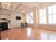 Open living area with hardwood floors and large windows at 32 Peachtree Nw St # 1601, Atlanta, GA 30303